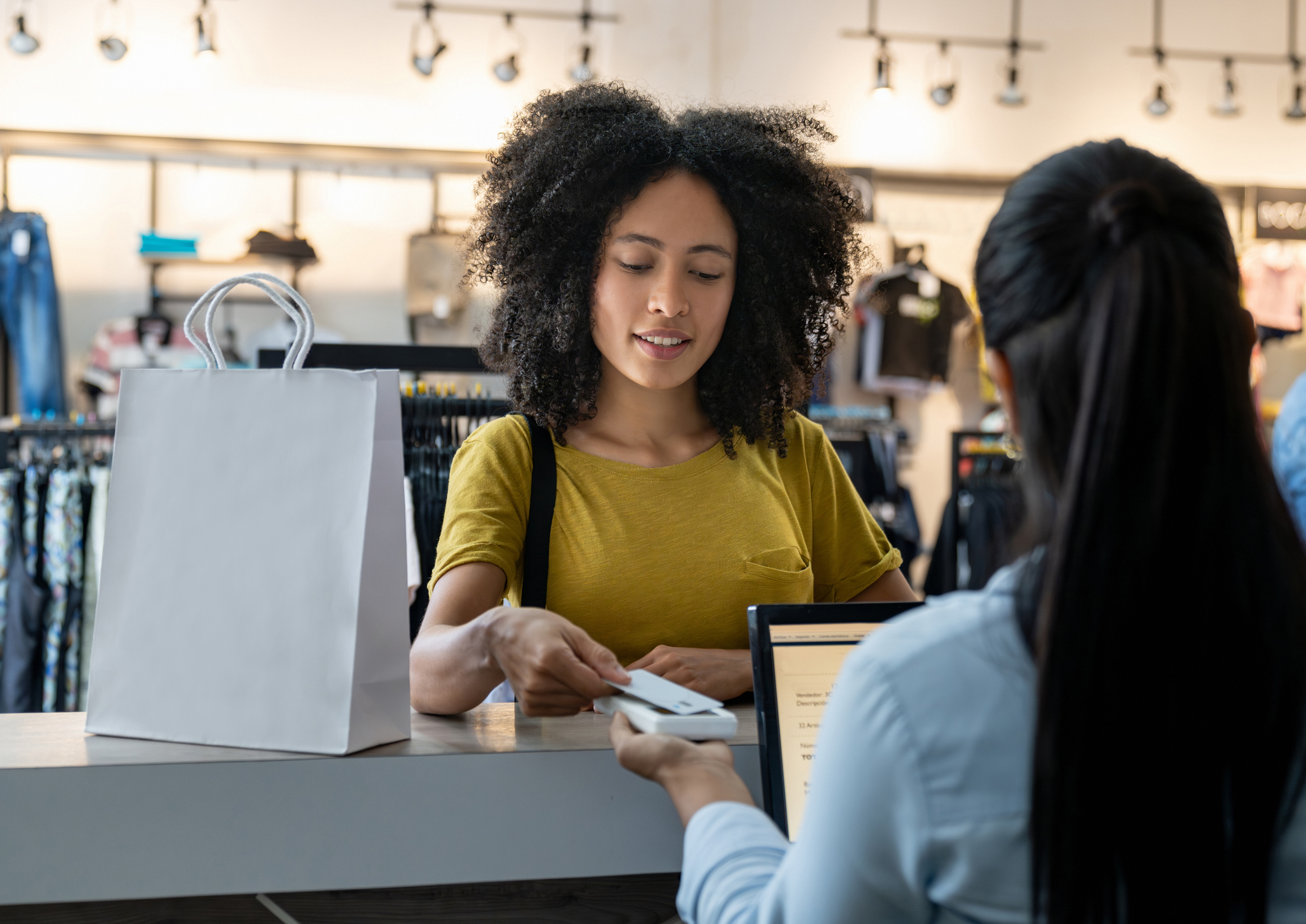  Women paying with her store credit card