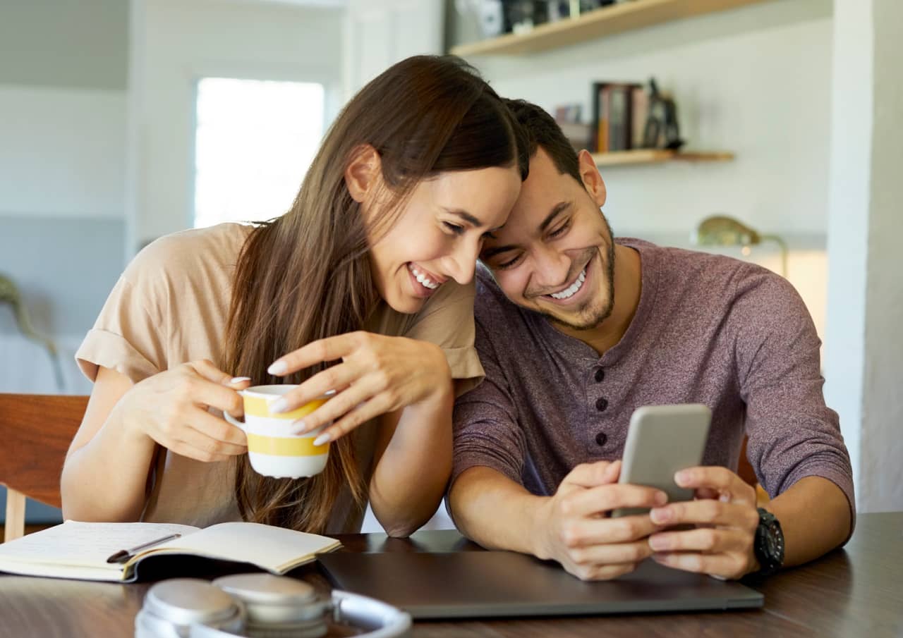 Couple looking at a phone